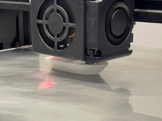 Benchy being printed on Wham Bam Flexible Build System